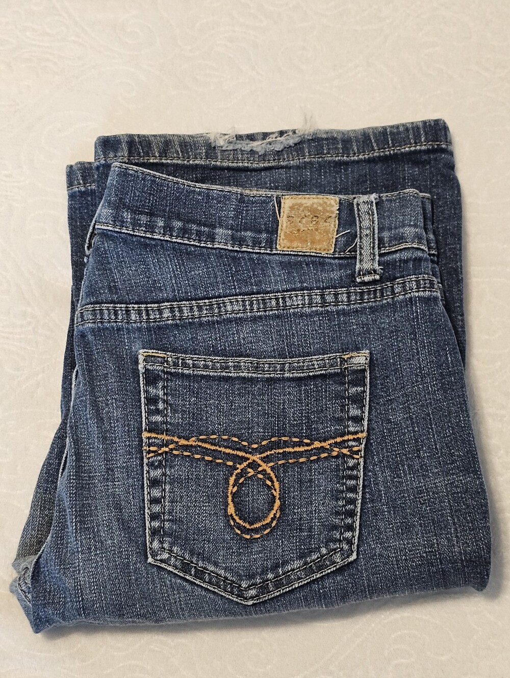 BCBG Paris Women’s Bootcut Jeans – Size 10 Medium Wash Stretch